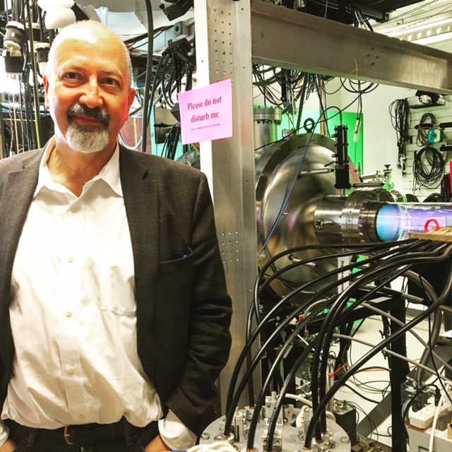 Professor Michael Brown in front of his plasma machine. 